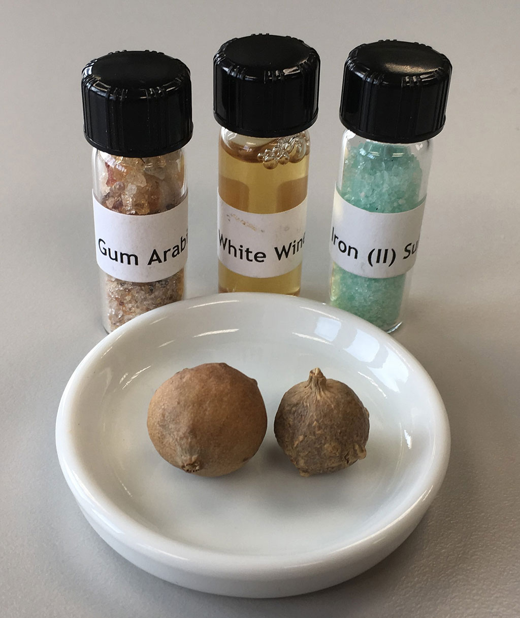 Materials for the creation of Iron Gall Ink: tree galls, gum arabic, white wine, and green vitriol [Iron (II) sulfate]