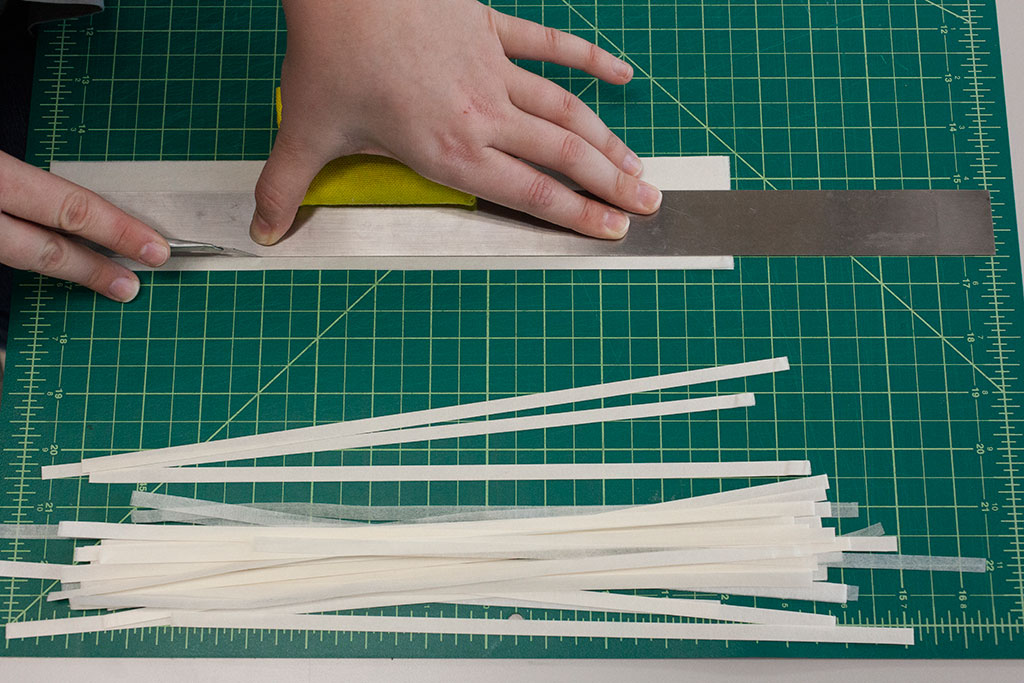 Preparing Japanese tissue paper tension strips