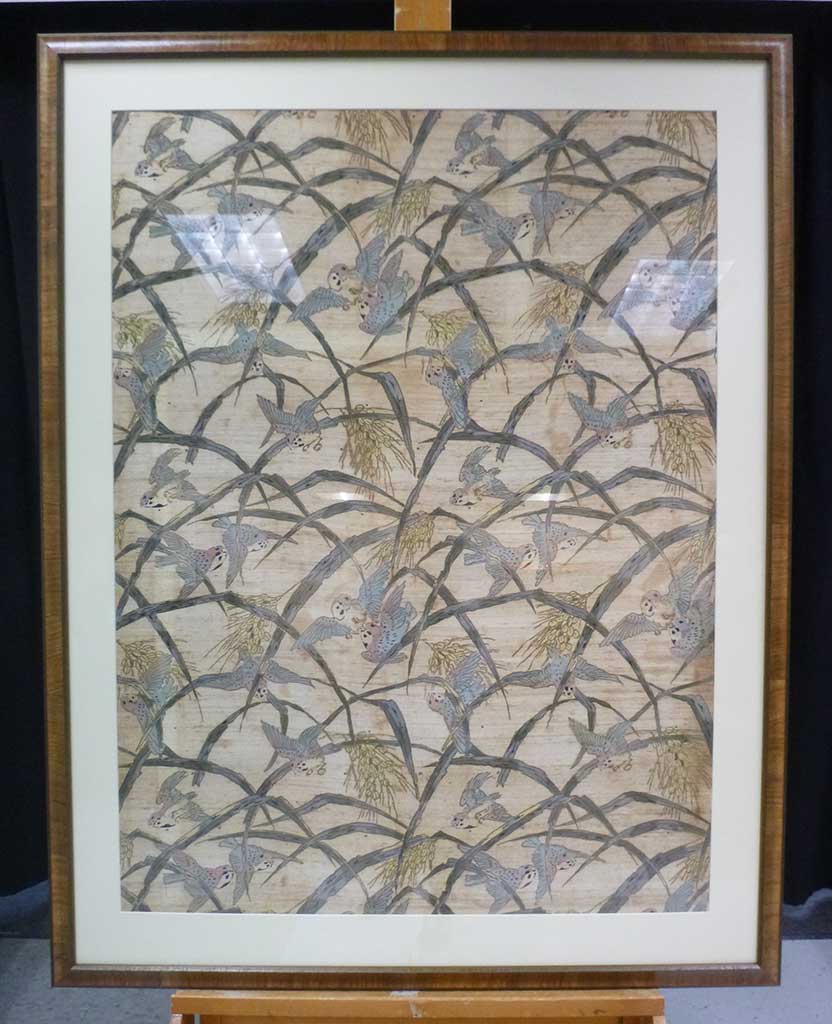 After imaging, the conserved wallpaper section was then framed using archival materials and UV filtering glazing in a wooden frame that was reminiscent of the bamboo latticework and selected by the Museum staff. 