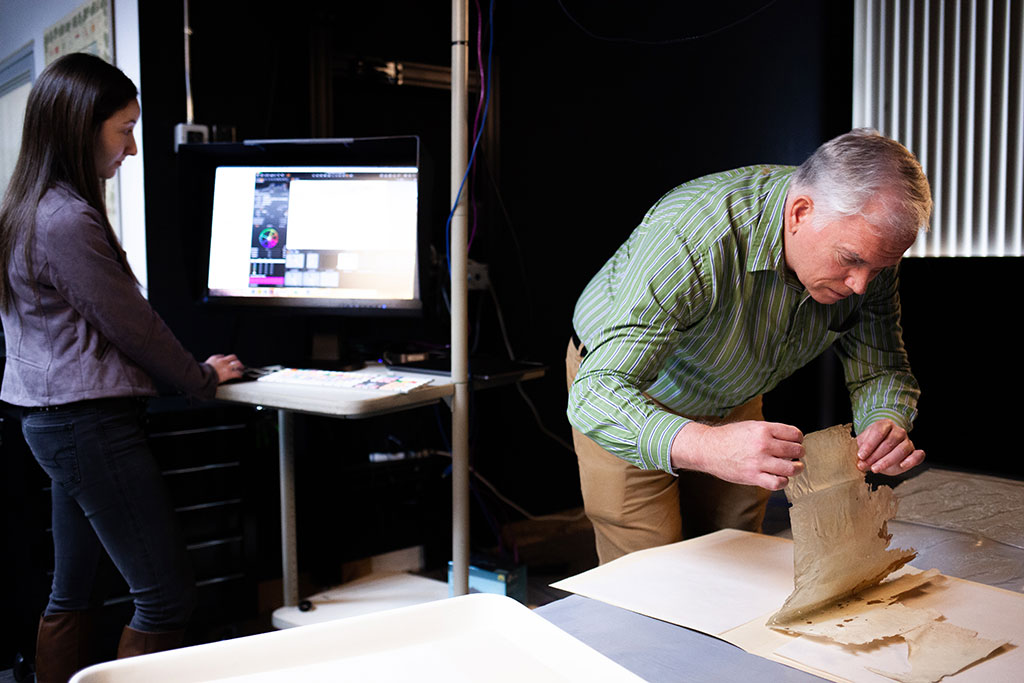 Preparing to digitize the interior of a bifolio