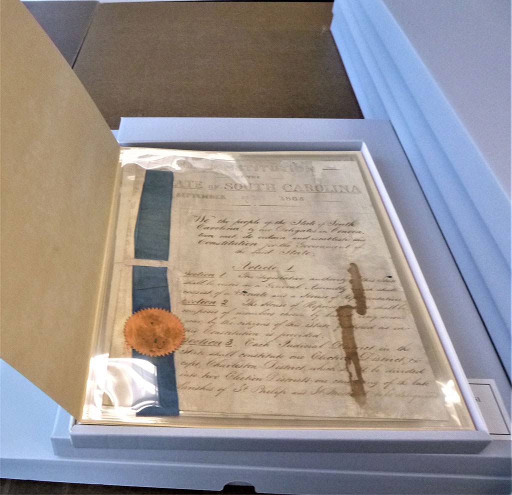 1778 and 1865 Constitution foldered and boxed for return