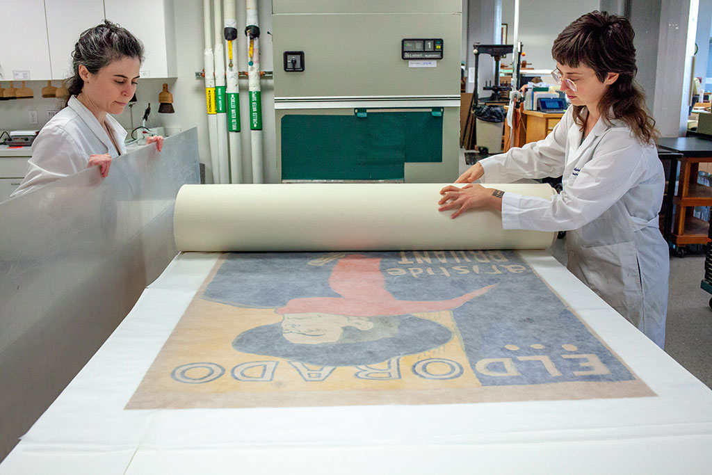 Rolling the top felt on for drying, and readying Plexiglas for flattening