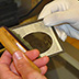 Lantern slides and other transparencies can be scanned on a flat-bed scanner in order to create a digital surrogate.