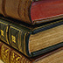 Historic volumes rebound in leather bindings appropriate to the periods of the text blocks.