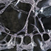 This acetate negative, in the last stage of deterioration, shows channeling where the emulsion has separated from its base.